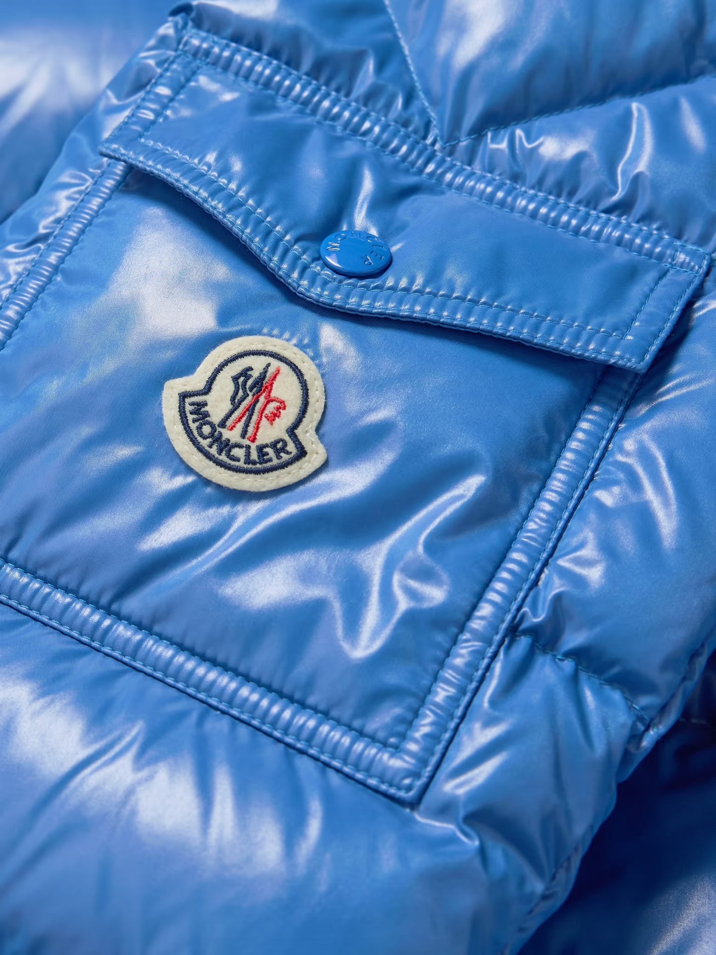 MONCLER
Maya Logo-Appliquéd Quilted Shell Hooded Down Jacket
