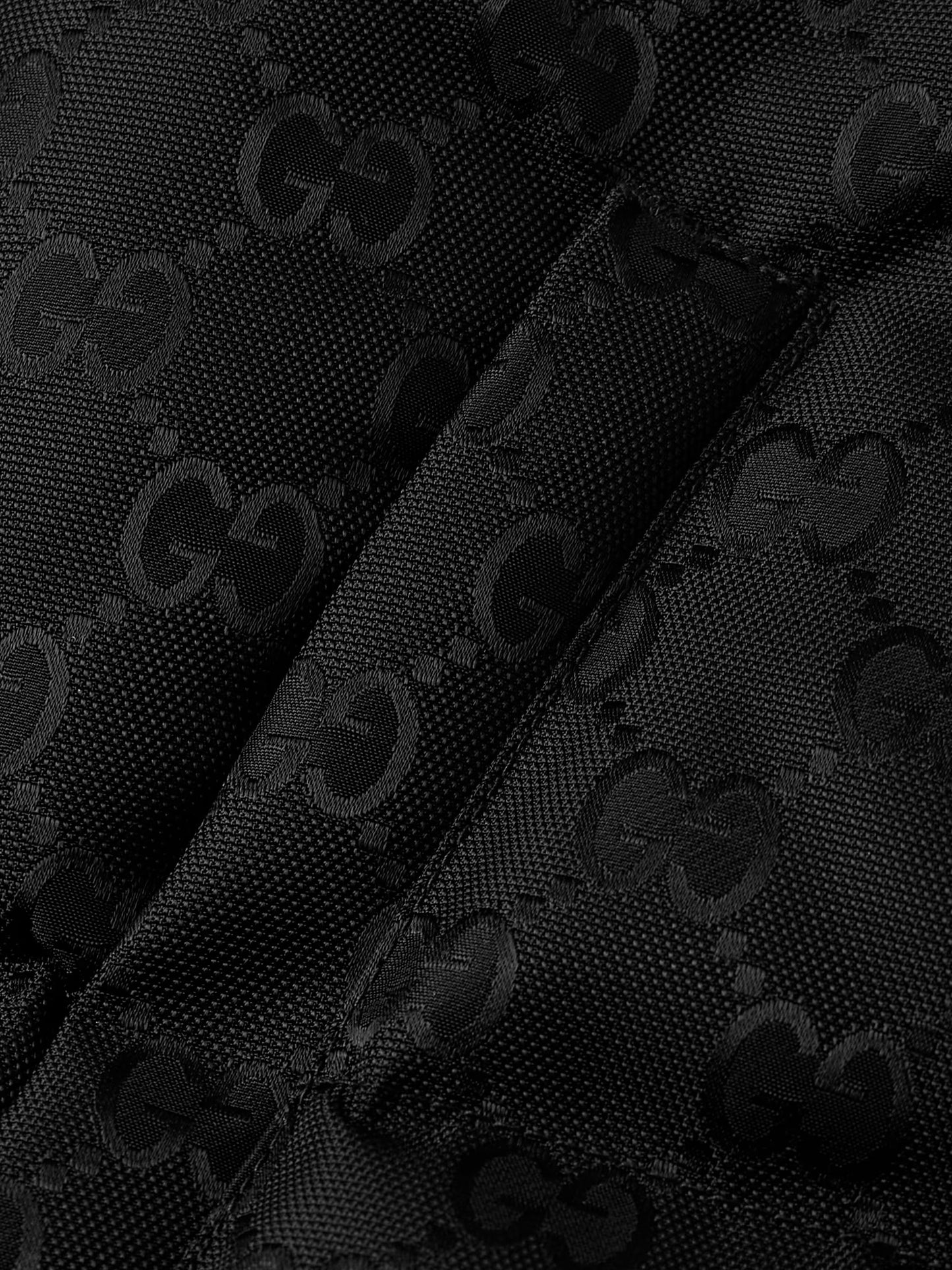 GUCCI
Quilted Logo-Jacquard Nylon Hooded Down Jacket